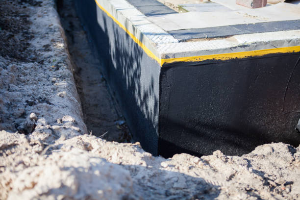 Professional Waterproofing technician working in Sharpsville, IN